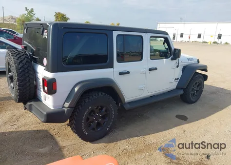 2021 Jeep Wrangler Unlimited Willys Sport 4X4 z USA, uszkodzony, nr VIN 1C4HJXDG9MW612703